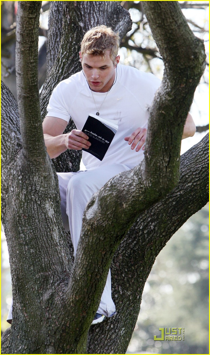 kellan lutz climbs tree reads book 07
