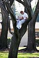 kellan lutz climbs tree reads book 31