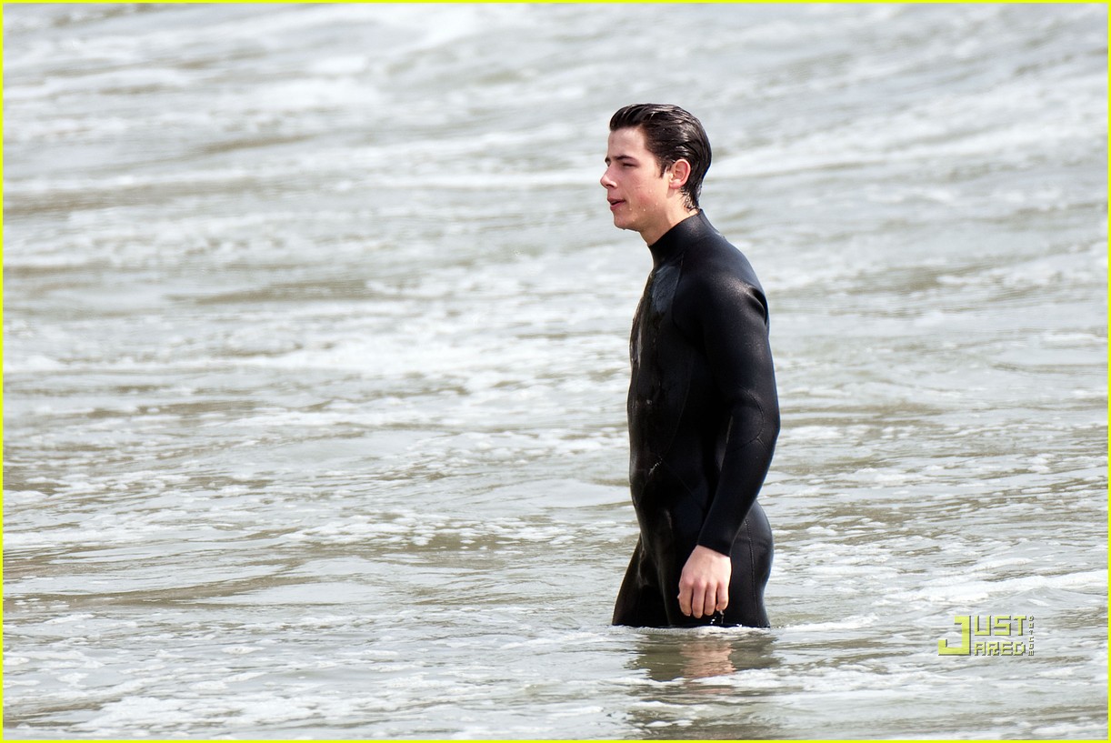 nick jonas malibu wetsuit beach 09