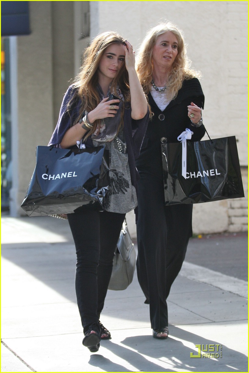 lily collins chanel shopping party 32
