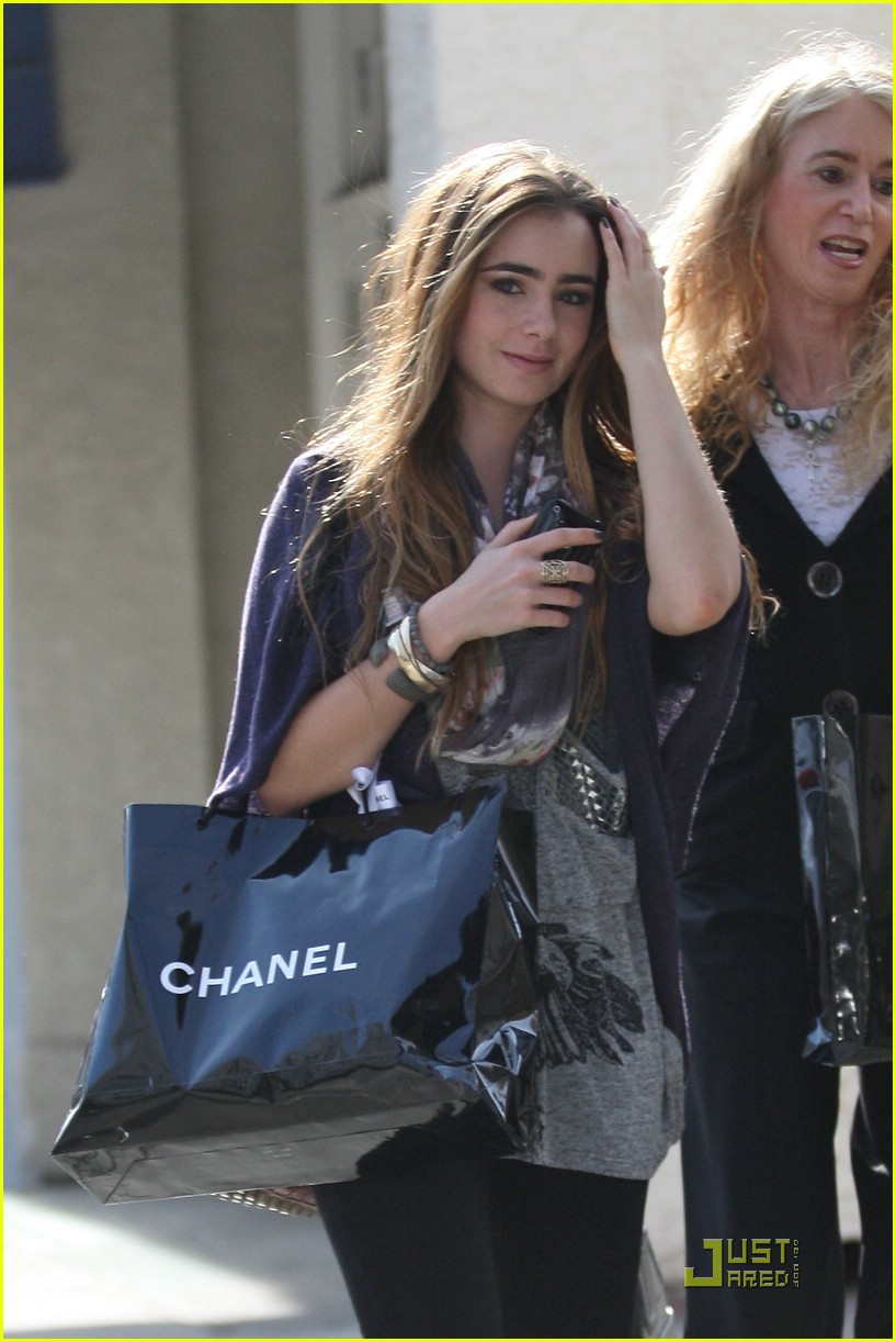 lily collins chanel shopping party 34
