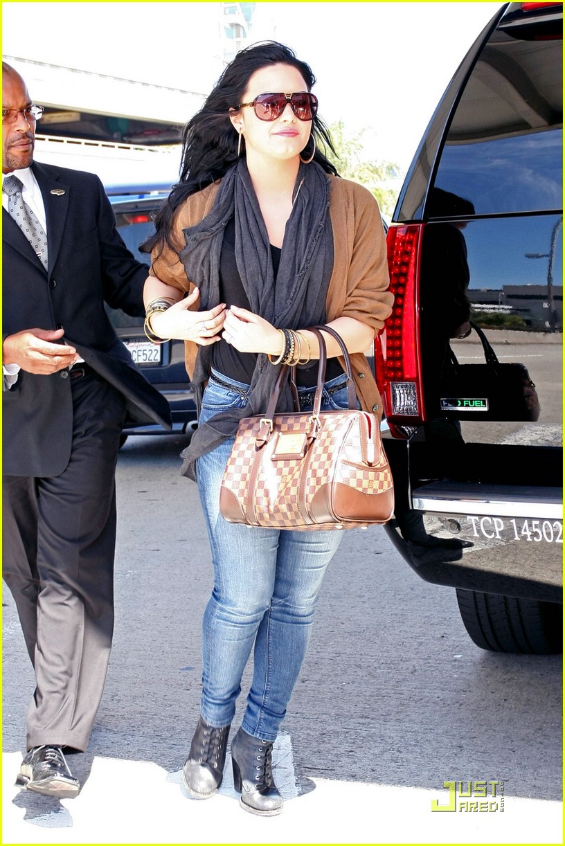 Demi Lovato shopping with her Louis Vuitton Berkeley Bag