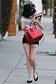 emma roberts digs red purse 02