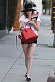 emma roberts digs red purse 08