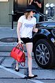 emma roberts digs red purse 10