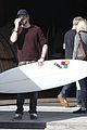 miley cyrus liam hemsworth surfboard 08