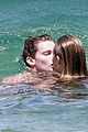 patrick schwarzenegger taylor burns kissing beach couple 06