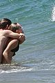 patrick schwarzenegger taylor burns kissing beach couple 07
