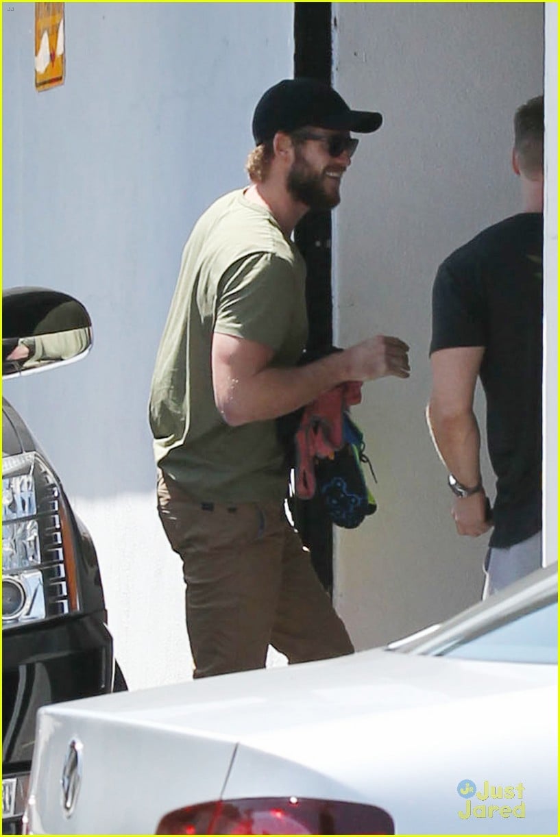 miley cyrus liam hemsworth separate monday outings 03
