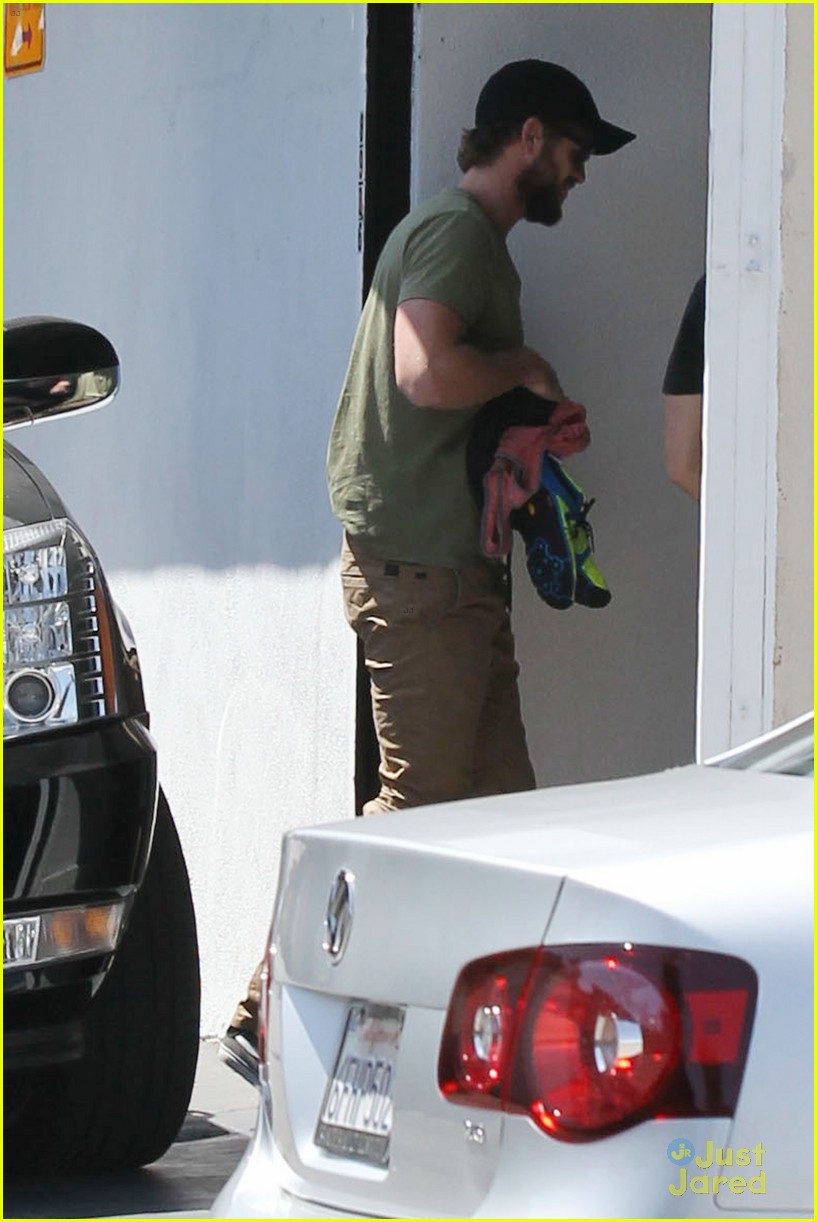 miley cyrus liam hemsworth separate monday outings 05