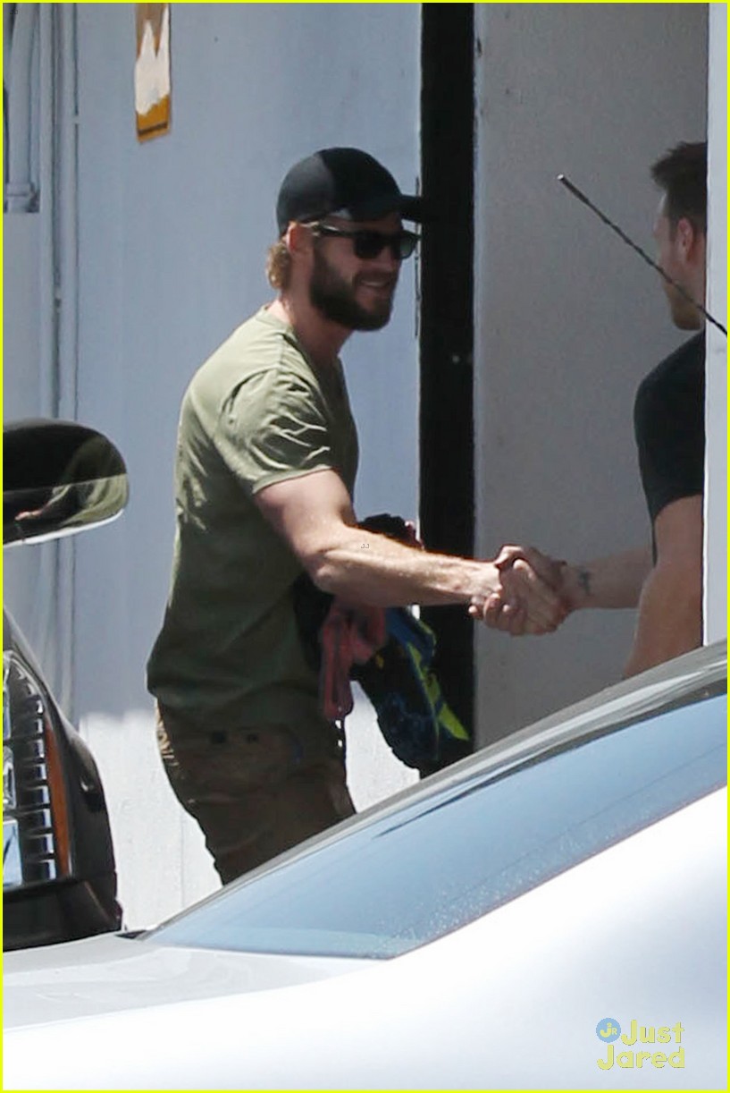 miley cyrus liam hemsworth separate monday outings 06