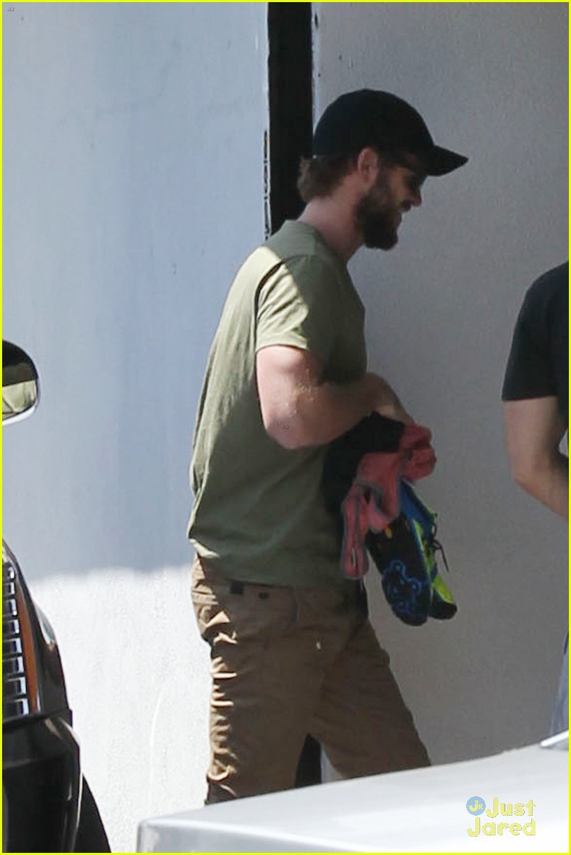 miley cyrus liam hemsworth separate monday outings 08