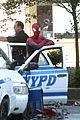 andrew garfield stands on cop car for spider man 2 04