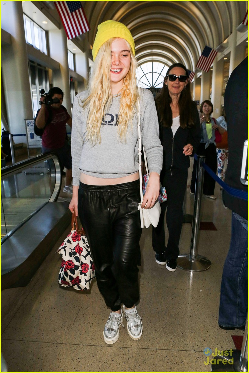 elle fanning lax arrival after met ball 03
