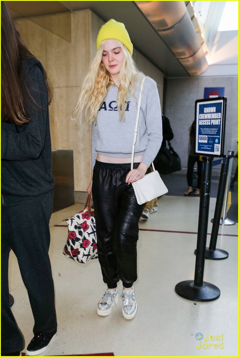 elle fanning lax arrival after met ball 08