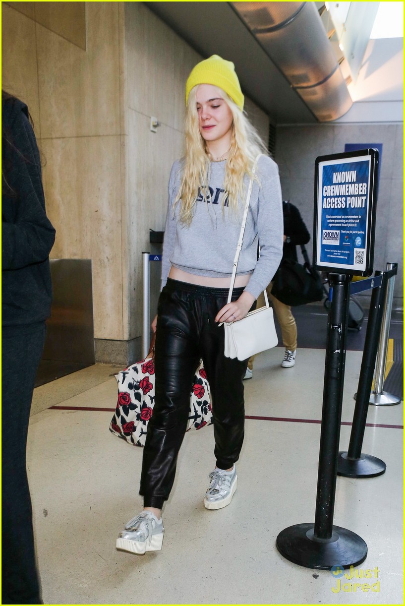 elle fanning lax arrival after met ball 11
