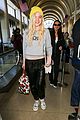 elle fanning lax arrival after met ball 03