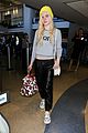 elle fanning lax arrival after met ball 05
