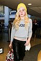 elle fanning lax arrival after met ball 09