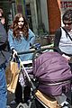 lily collins pushes stroller on love rosie set 01
