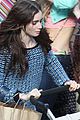 lily collins pushes stroller on love rosie set 04