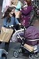 lily collins pushes stroller on love rosie set 05
