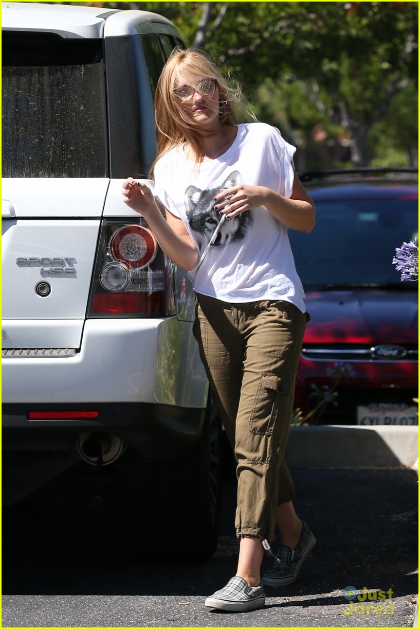 aly michalka stops by young hollywood aj picks up dry cleaning 01