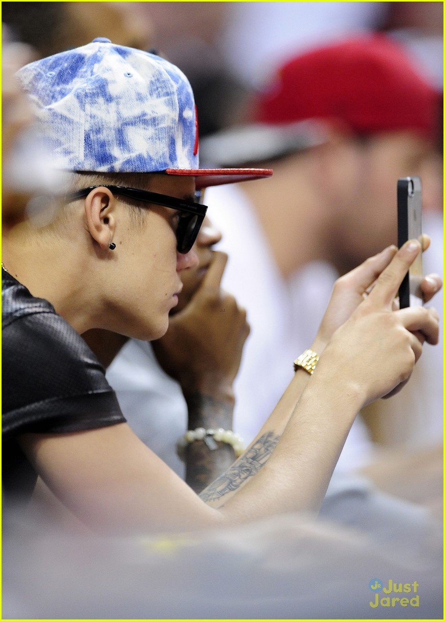 justin bieber sits courtside at miami heat playoff game 16