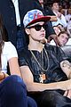 justin bieber sits courtside at miami heat playoff game 03