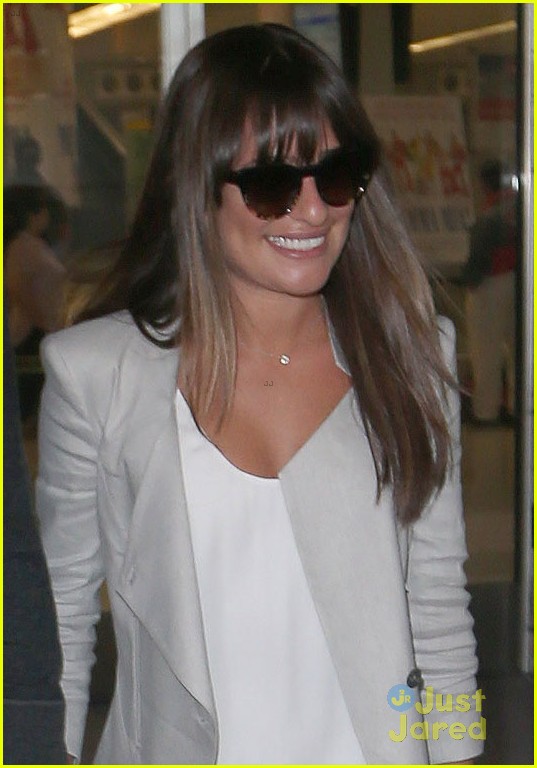 lea michele cory monteith touch down at jfk 03