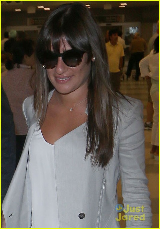 lea michele cory monteith touch down at jfk 05