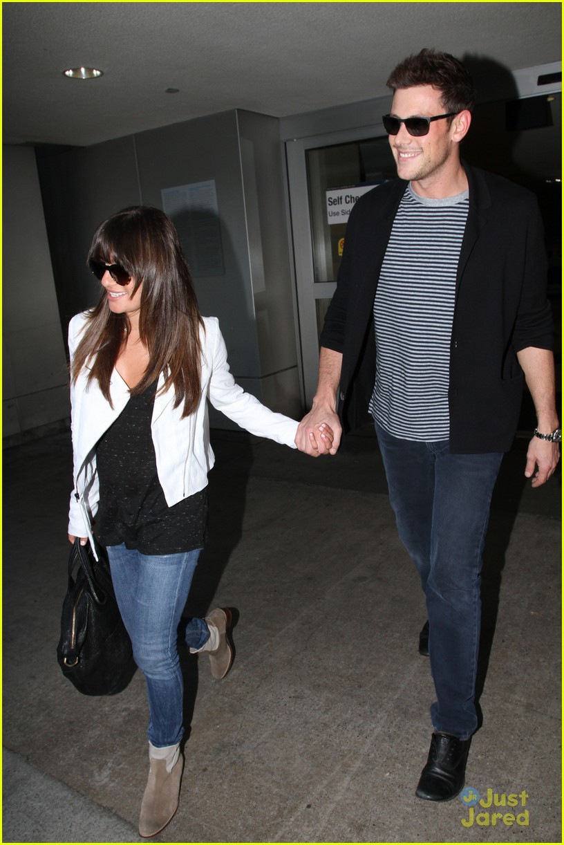 lea michele cory monteith holding hands lax 04