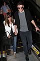 lea michele cory monteith holding hands lax 05
