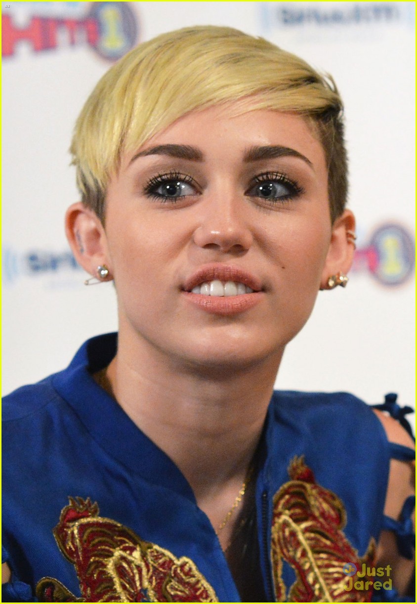 miley cyrus confirms engagement to liam hemsworth 04
