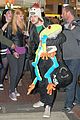 the wanted jay mcguiness carries froggy friend at the airport 01