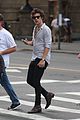 harry styles checks his phone in nyc 03