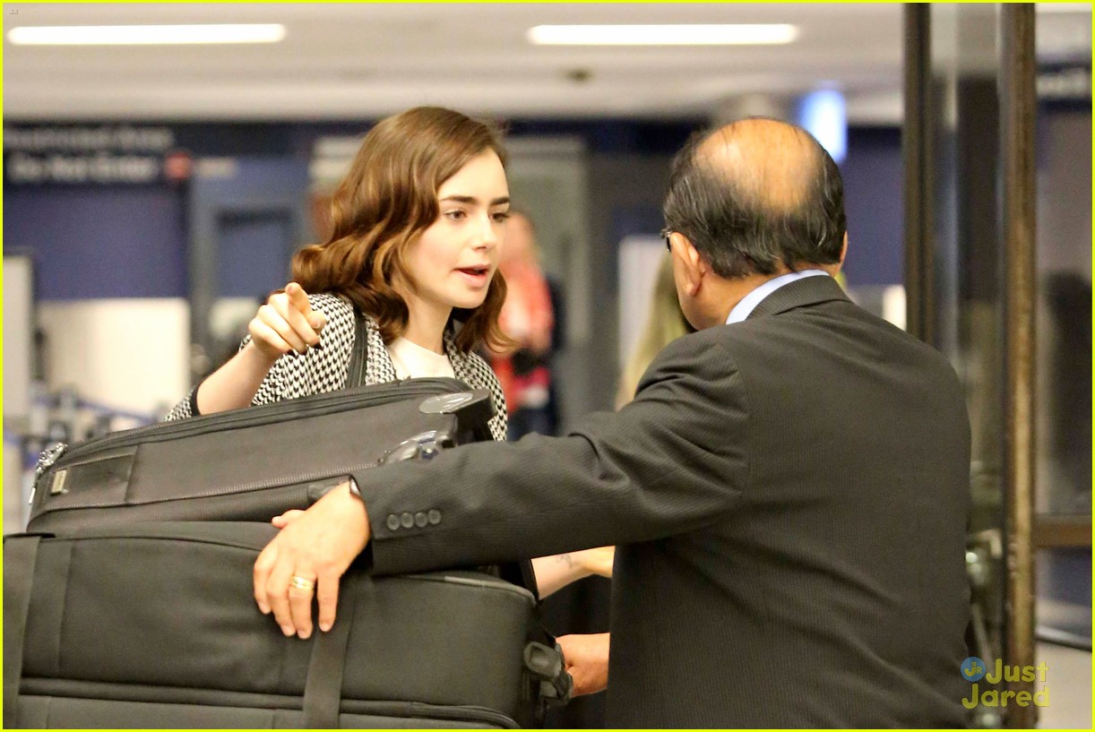 lily collins lax arrival hug 15