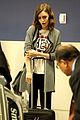 lily collins lax arrival hug 04