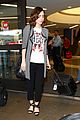 lily collins lax arrival hug 09