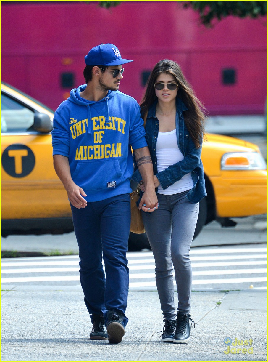 taylor lautner marie avgeropoulos holding hands soho 03