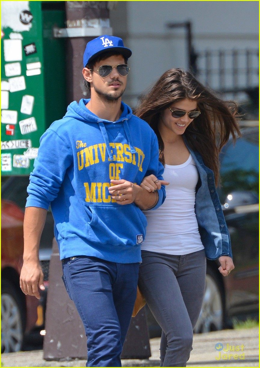 taylor lautner marie avgeropoulos holding hands soho 04