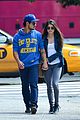 taylor lautner marie avgeropoulos holding hands soho 03