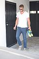liam hemsworth outfit switch at the gym 01