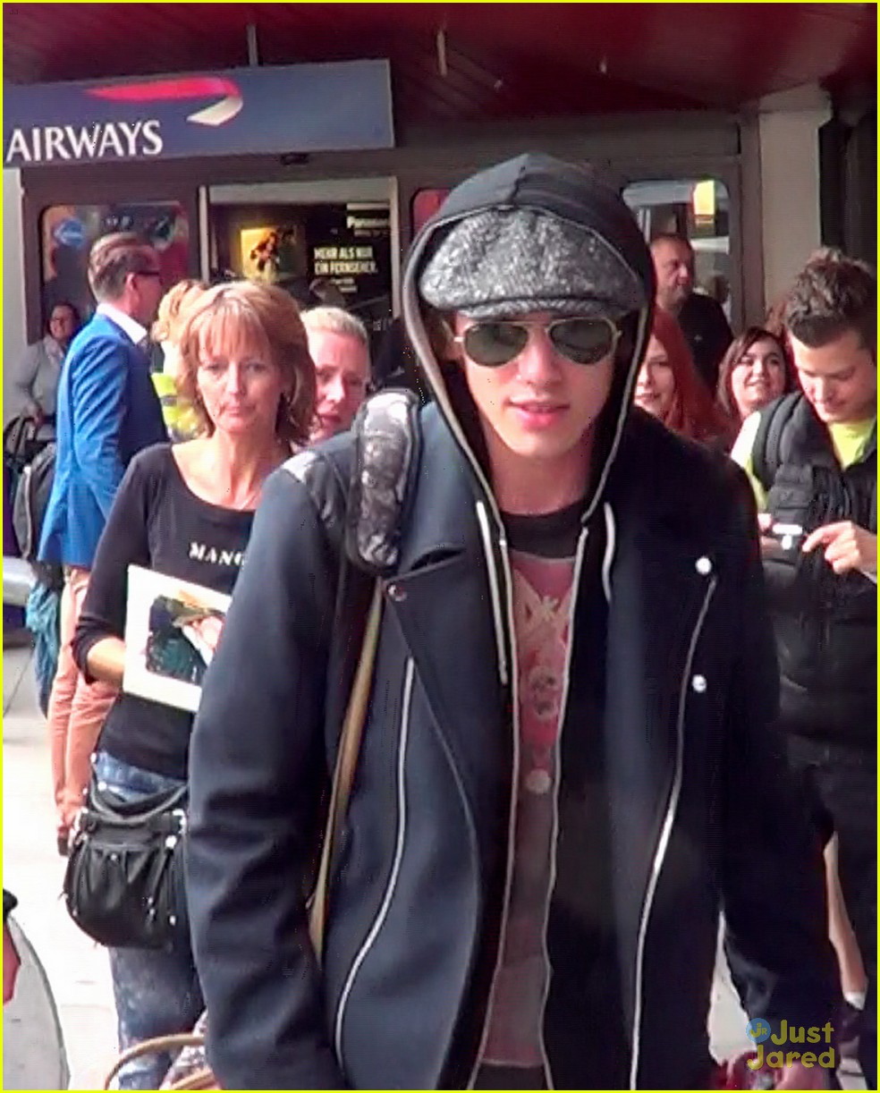 lily collins jamie campbell bower arrive in berlin 04