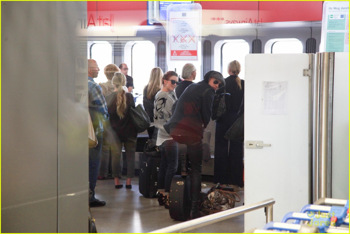 lily collins jamie campbell bower arrive in berlin 07