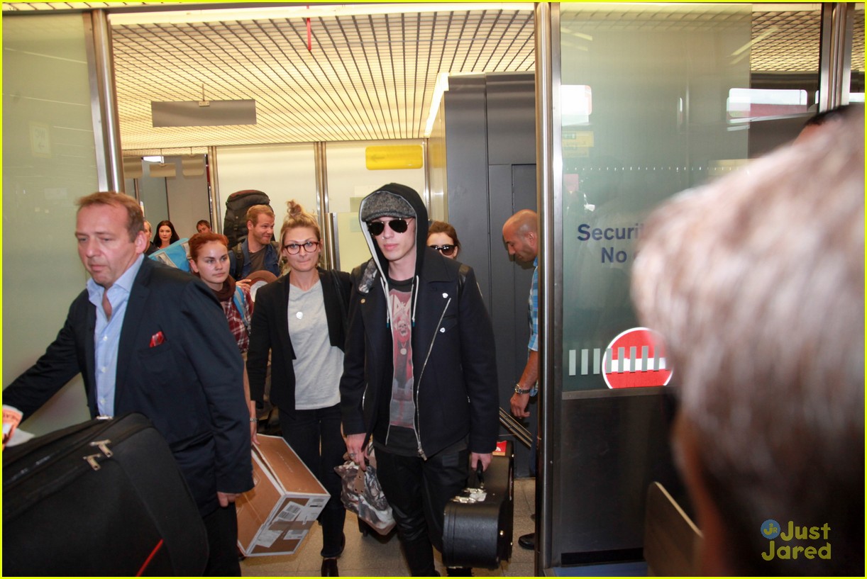 lily collins jamie campbell bower arrive in berlin 11