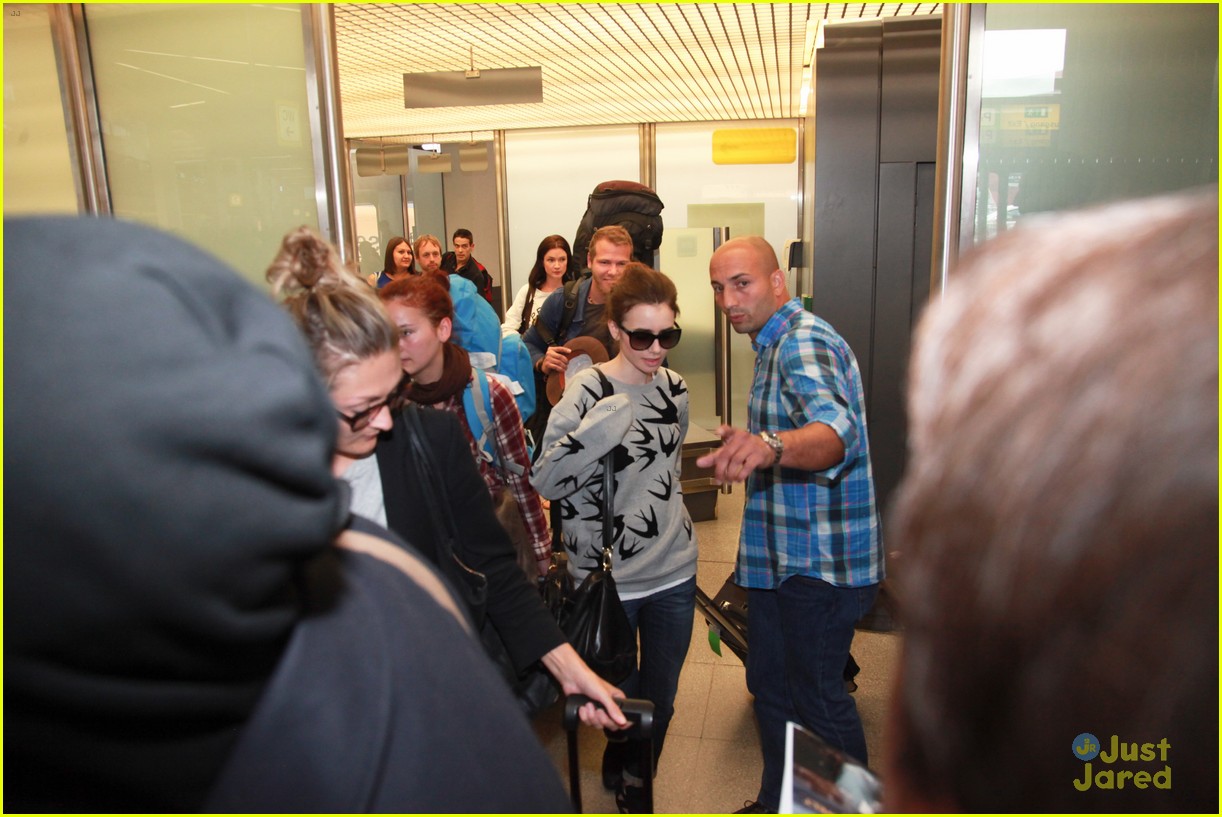 lily collins jamie campbell bower arrive in berlin 12