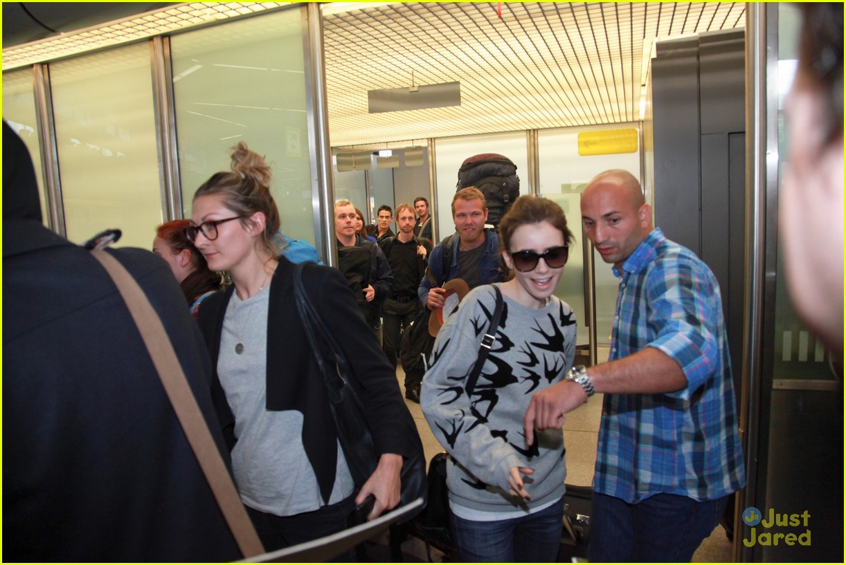 lily collins jamie campbell bower arrive in berlin 13