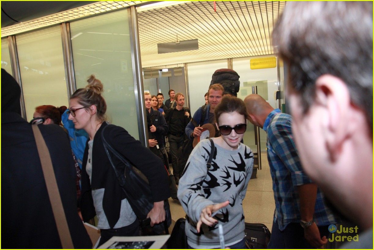 lily collins jamie campbell bower arrive in berlin 15