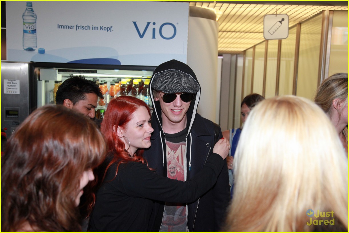lily collins jamie campbell bower arrive in berlin 16